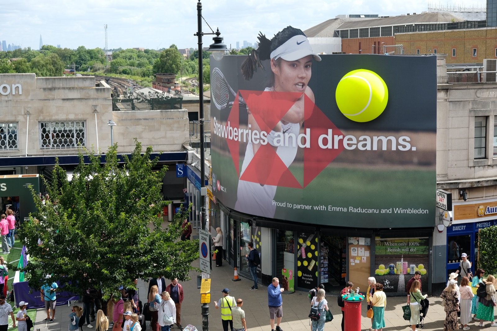 Wimbledon tennis event 3d building wrap Events crew installation of Wimbledon tennis event large format creative 3d outdoor banner wrap