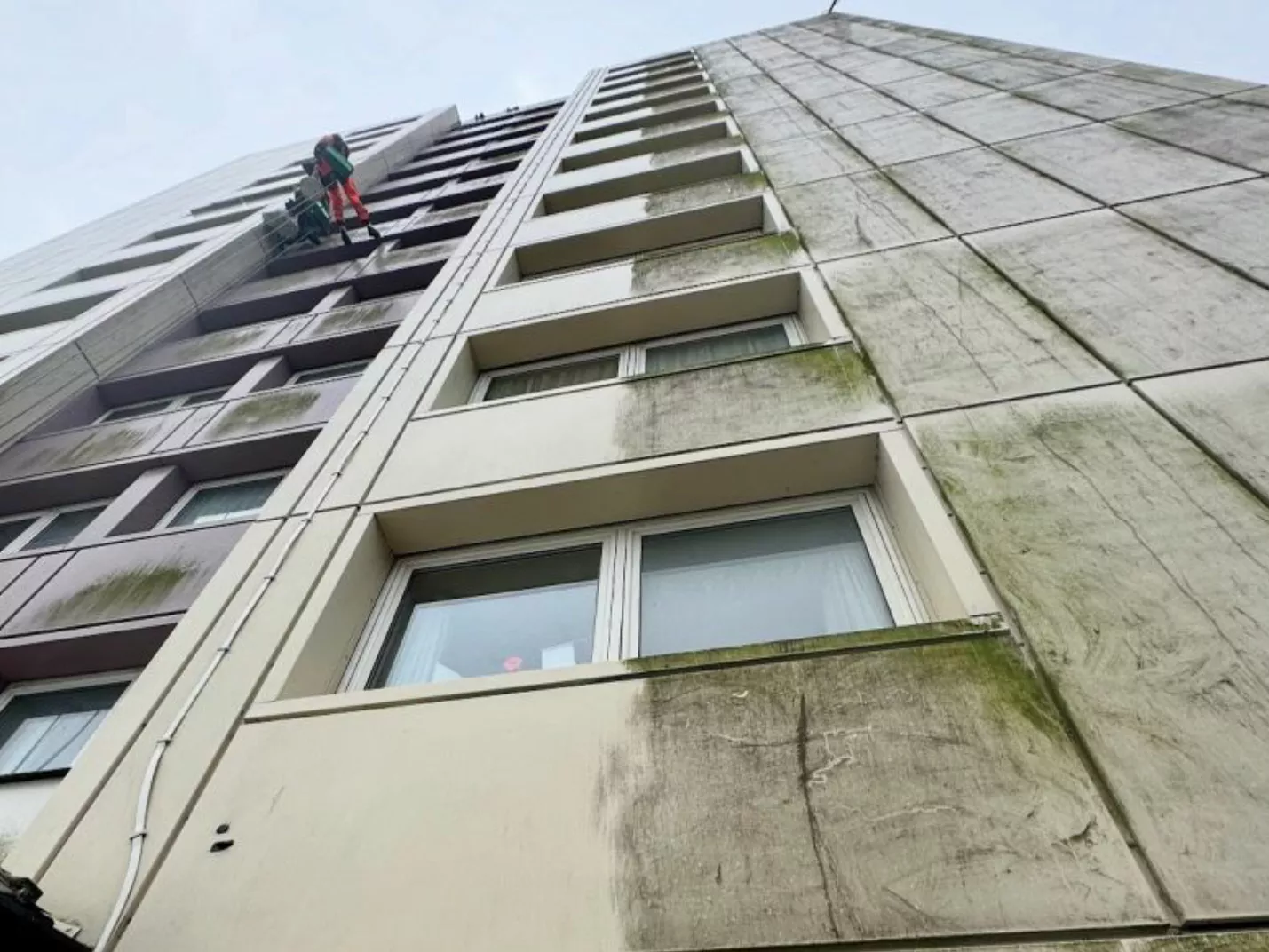 Facade Cleaning via Rope Access. Cladding, windows, glass - Industrial ...